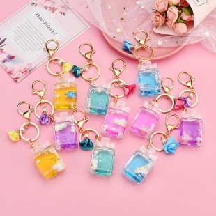 جاسوئیچی آکواریومی با کارکترهای کارتونی Liquid animals character keychain