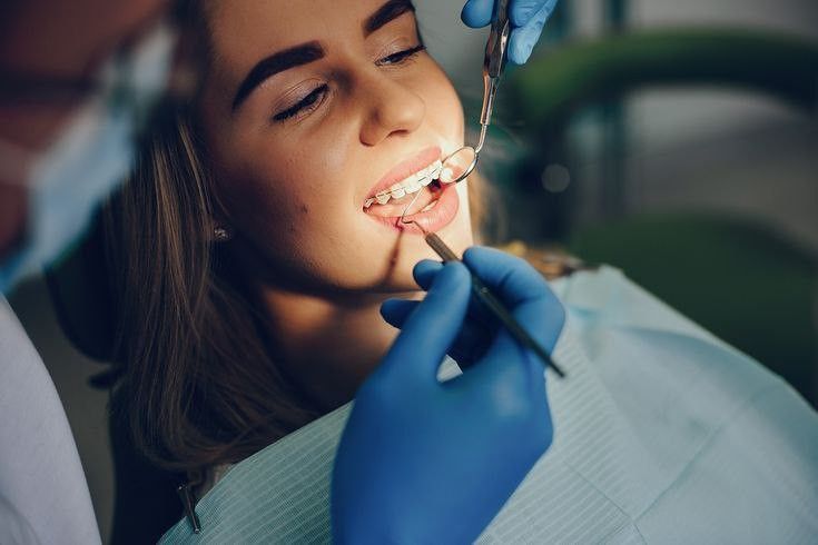 آدرس و شماره تماس و ساعت کاری کلینیک دندانپزشکی ارکیده