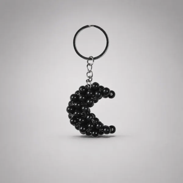 جاکلیدی طرح ماه مهره‌ای مشکی