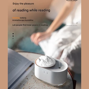 مرطوب کننده و آروماتراپی شارژی طرح کوه یخ چرخان