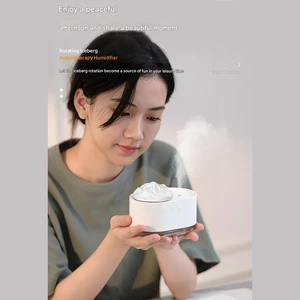 دستگاه رطوبت ساز و آروماتراپی شارژی طرح کوه یخ چرخان