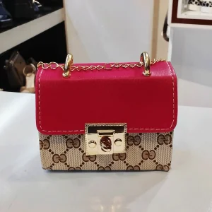 کیف دستی زنانه طرح گوچی دو رنگ با قفل چرخشی فلزی