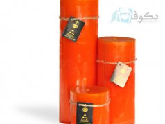 شمع کنار سالنی با رنگ نارنجی
