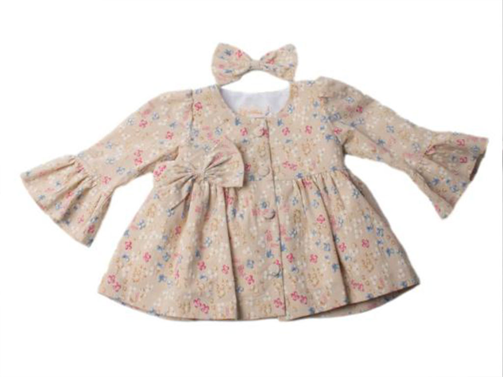 پیراهن آستین بلند نوزادی دخترانه کرم رنگ طرح گل های رنگی به همراه گلسر انبری