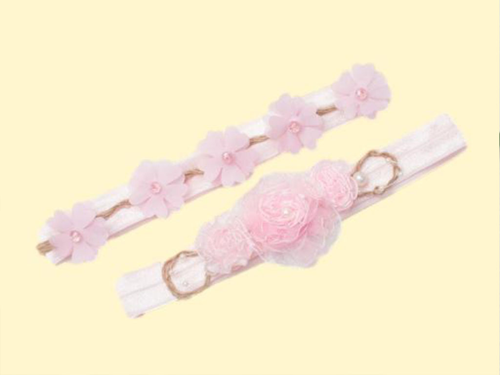 هدبند کشی نوزادی طرح گل های برجسته صورتی