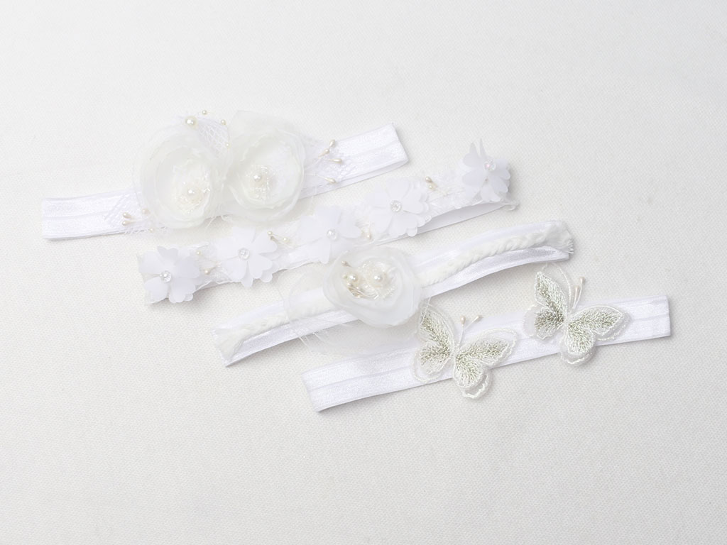 هدبند کشی نوزادی طرح پروانه و گل های برجسته سفید