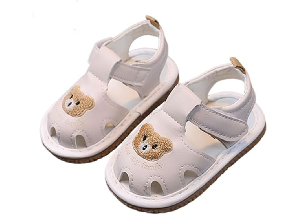 کفش سوتی و جغجغه ای نوزادی رنگ شیری طرح خرس