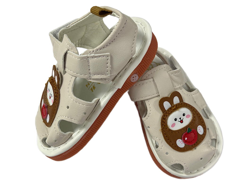 کفش سوتی و جغجغه ای نوزادی رنگ شیری طرح خرگوش