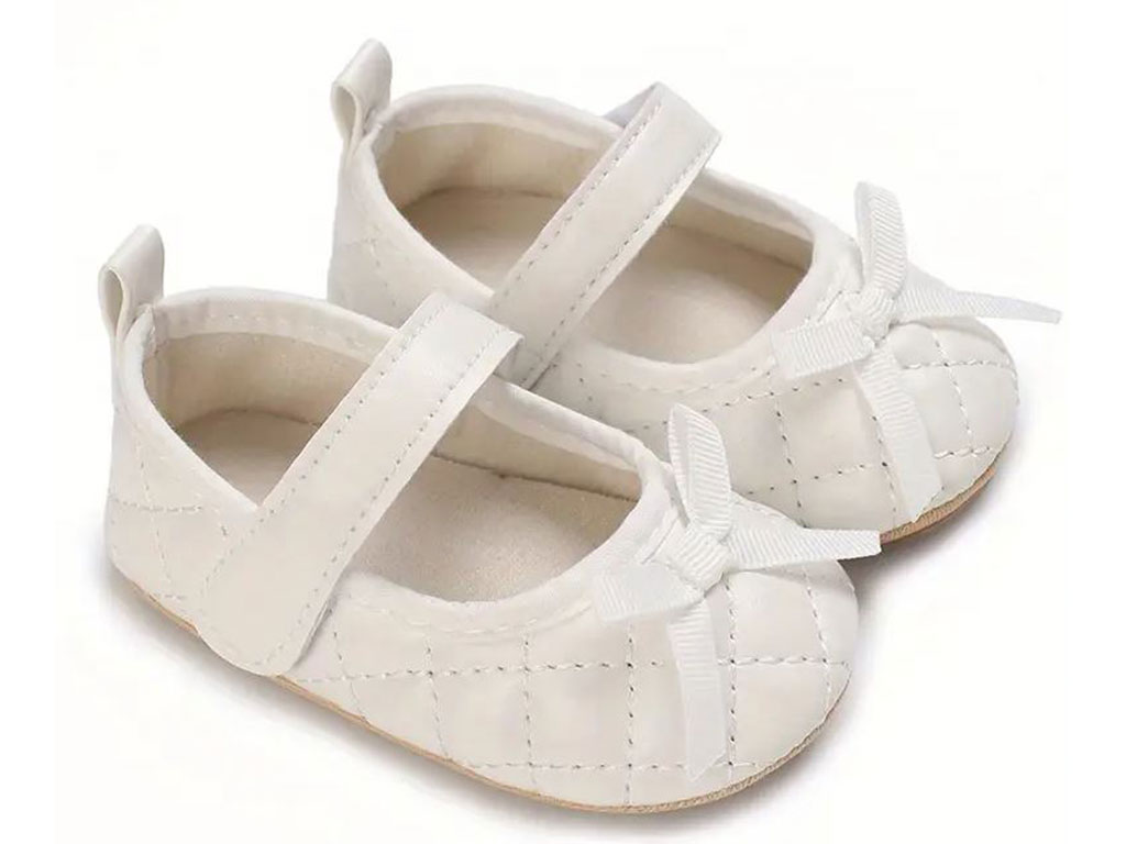 پاپوش استپ دار نوزادی رنگ شیری طرح پاپیون