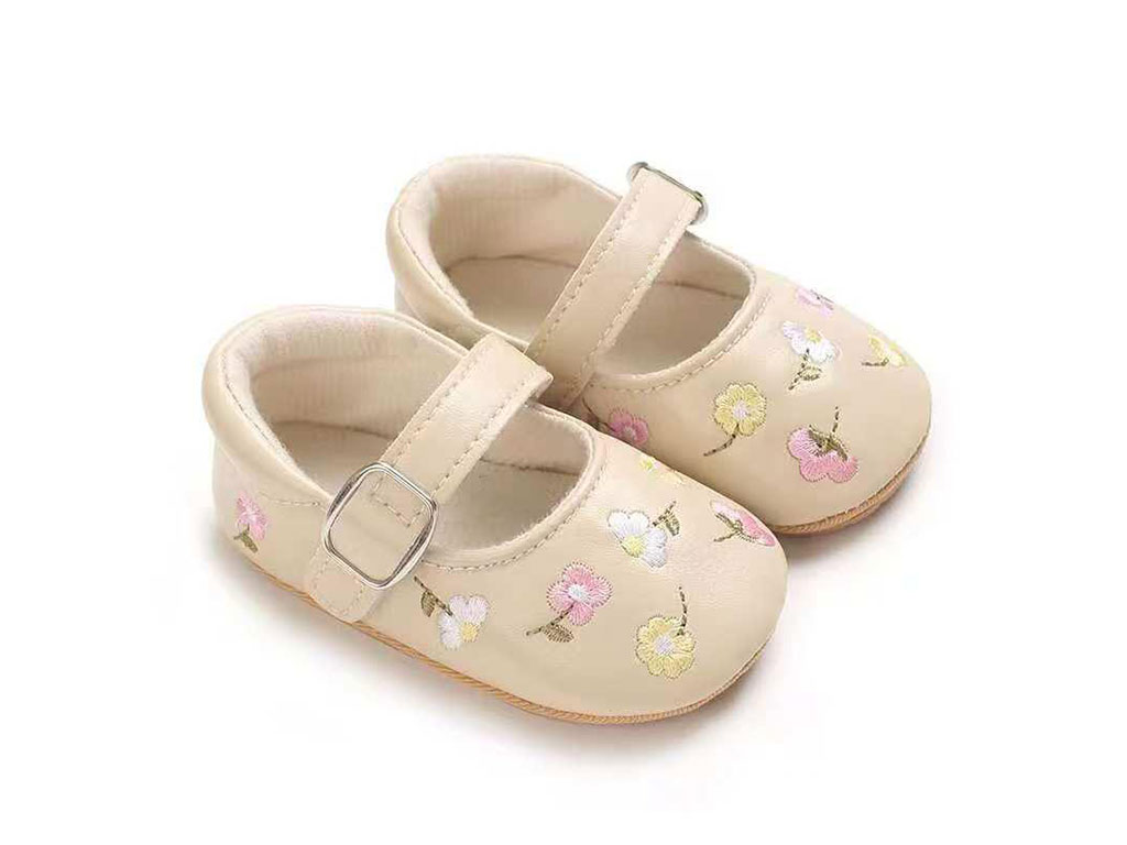 پاپوش استپ دار نوزادی رنگ نسکافه ای طرح گل های رنگارنگ