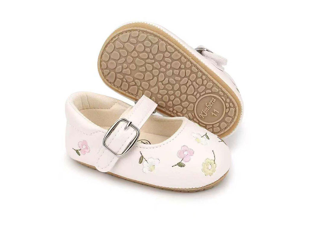 پاپوش استپ دار نوزادی رنگ کرم طرح گل های رنگارنگ