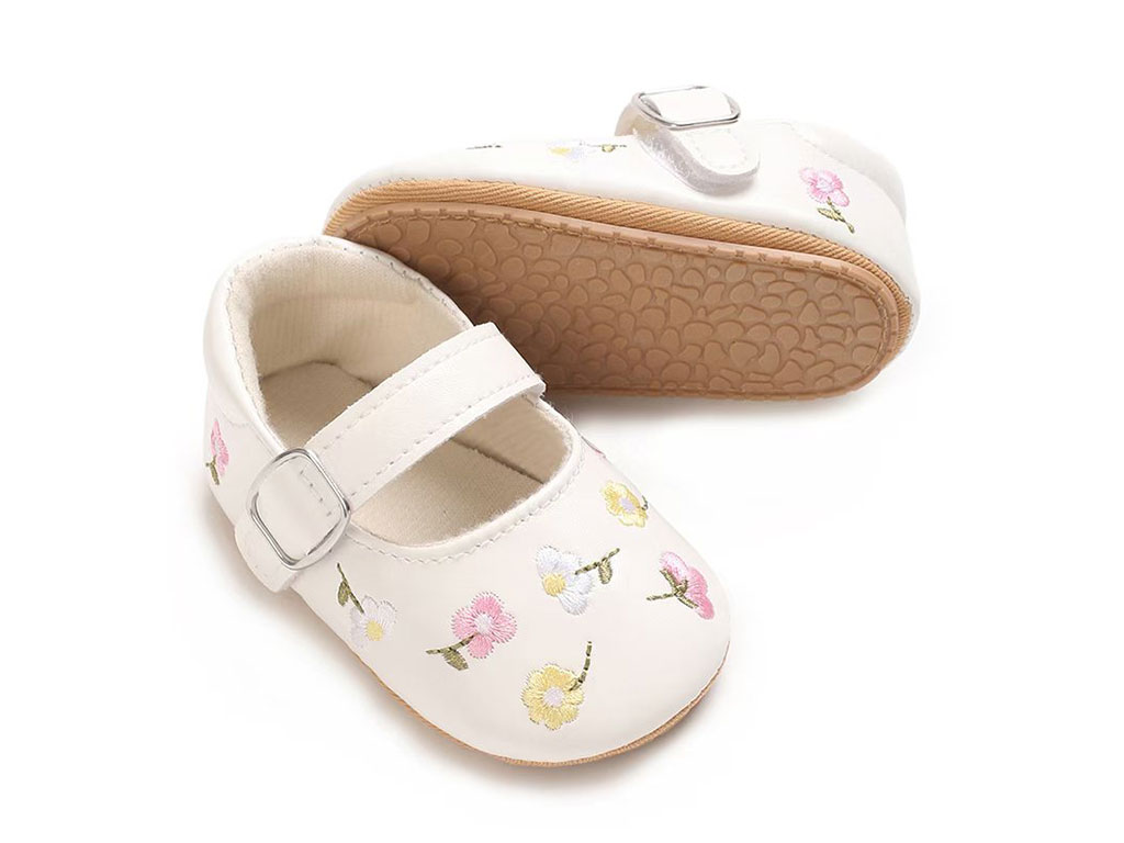 پاپوش استپ دار نوزادی رنگ کرم طرح گل های رنگارنگ