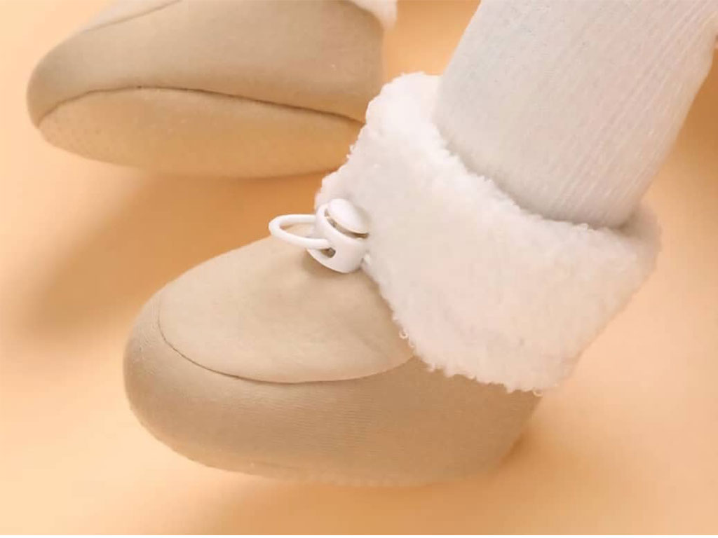 پاپوش ساق دار زمستانی استپ دار توکرکی رنگ کرم طرح دور پشمی