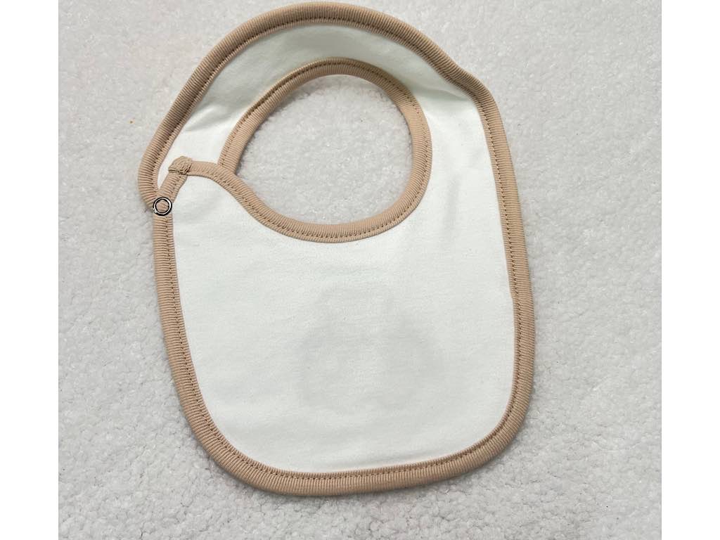 پیشبند نوزادی دخترانه رنگ شیری طرح سوئیت پاریز Pariz