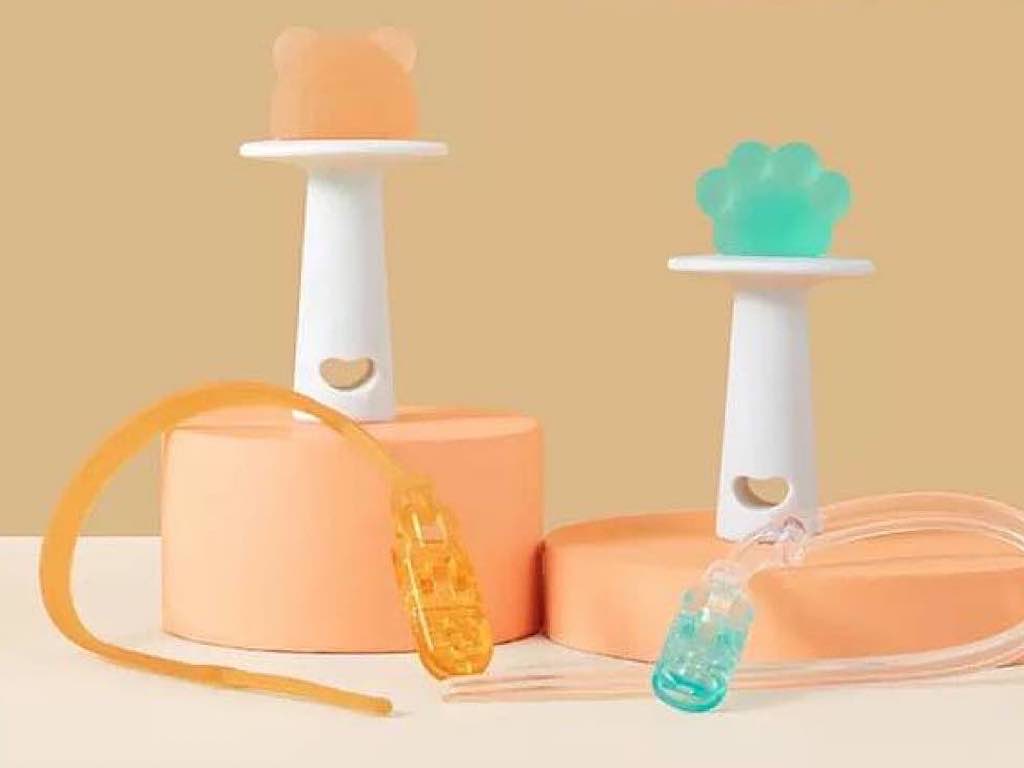 دندانگیر سیلیکونی دو عددی نوزادی قابدار به همراه بند پستانک