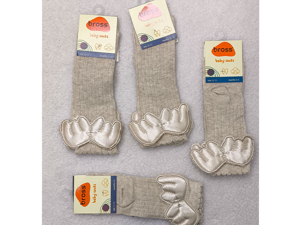 جوراب ساق بلند دخترانه بال دار کرم رنگ bross