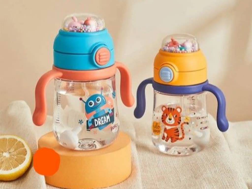 لیوان نی دار و دکمه ای نوزادی آنتی کولیک مدل جغجغه ای 260ml با سری نی یدک رووکو rovco