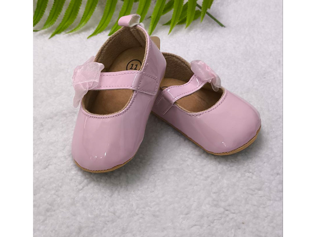 پاپوش صورتی رنگ استپ دار نوزادی دخترانه طرح پاپیون توری