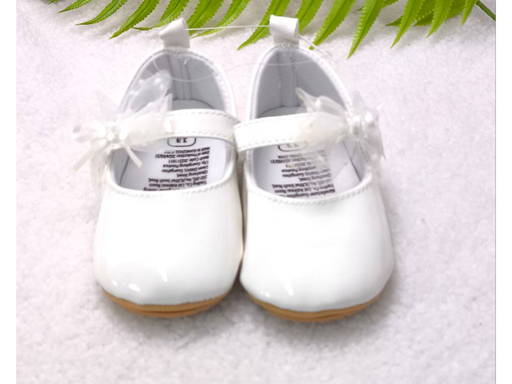 پاپوش سفید رنگ استپ دار نوزادی دخترانه طرح پاپیون توری