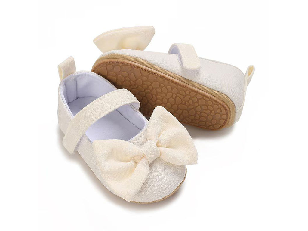 پاپوش شیری رنگ استپ دار نوزادی دخترانه طرح پاپیون