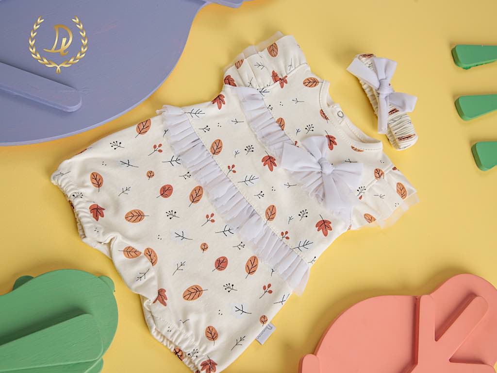 رامپر  نوزادی گلدوزی شده طرح برگ دانالو ( بدون تل )