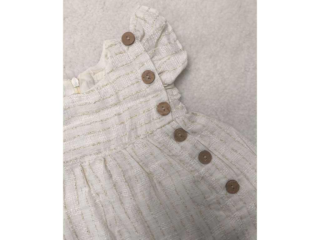 سارافون دخترانه رنگ شیری طرح نقلی راه دار بغل دکمه