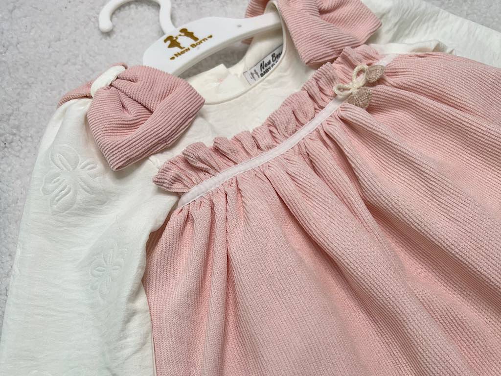 پیراهن دخترانه مخمل صورتی جلو سینه پلیسه پاپیون دار نیوبرن New Born