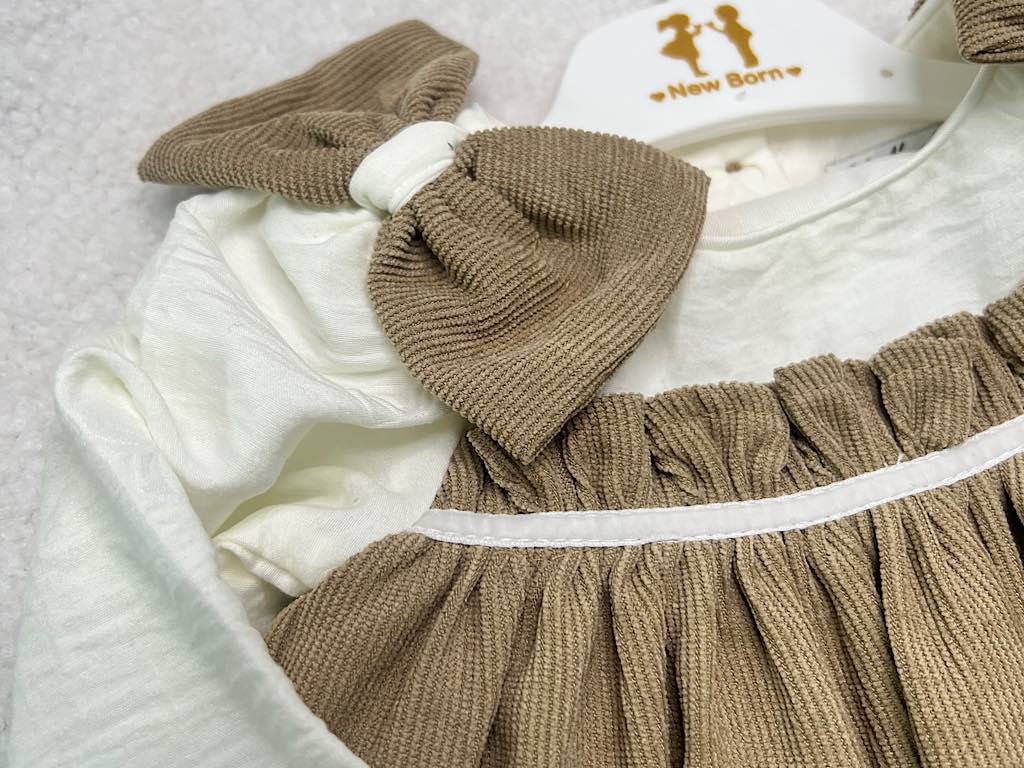 پیراهن دخترانه مخمل نسکافه ای  جلو سینه پلیسه پاپیون دار نیوبرن New Born