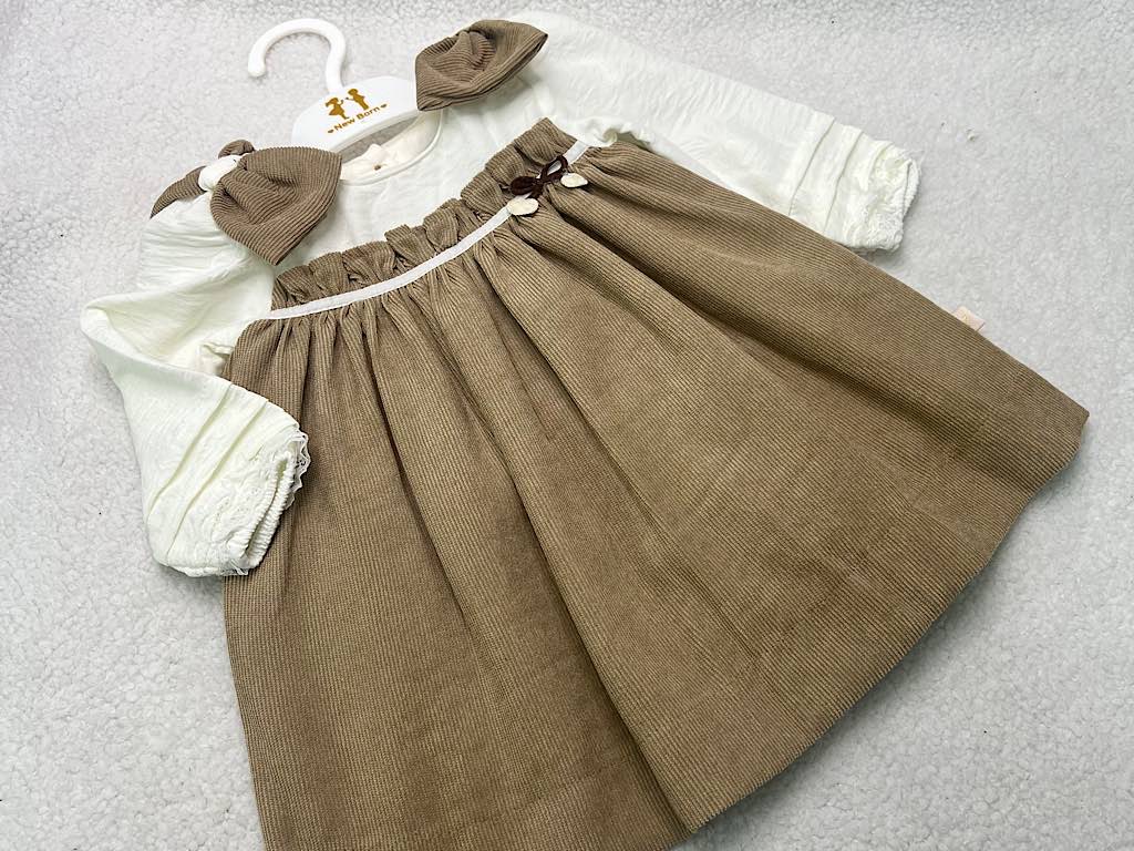 پیراهن دخترانه مخمل نسکافه ای  جلو سینه پلیسه پاپیون دار نیوبرن New Born