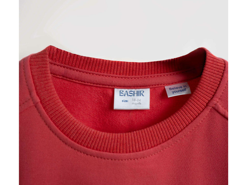 بلوز آستین بلند دورس رنگ مرجانی طرح H بشیر Bashir