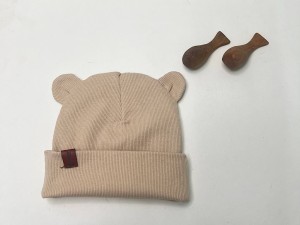 کلاه دو لایه  گرد گوش دار کبریتی نوزادی رنگ کرم نسکافه ای