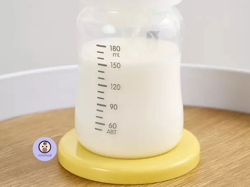 شیردوش همراه با شیشه شیر