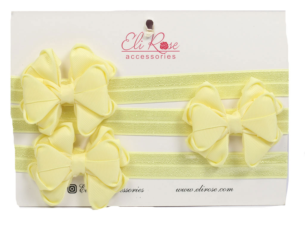 هدبند نوزادی طرح گل و پاپیون