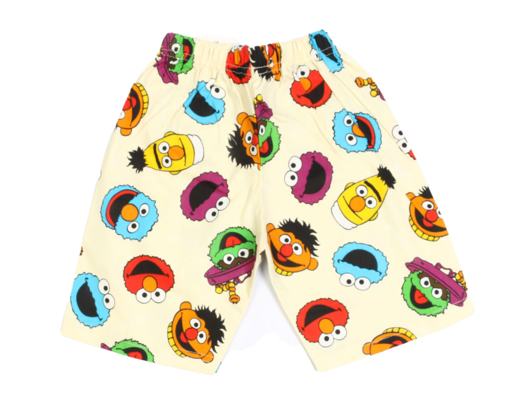 شلوارک کمرکش پسرانه کرم رنگ طرح کارتونی