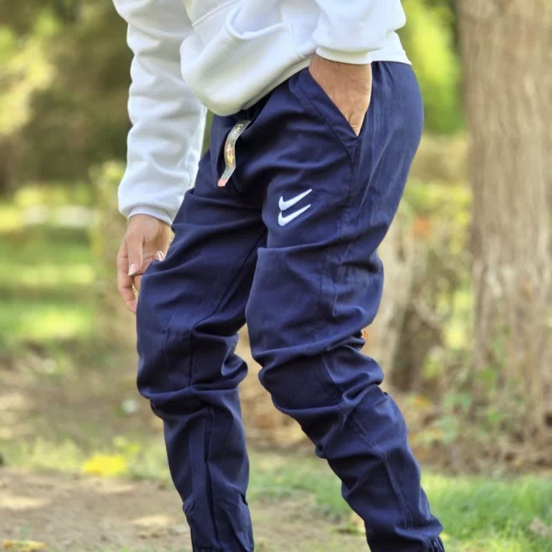 تخفیف ویژه شلوار اسلش مردانه پسرانه طرح نایک تن خور عالی و راحت رنگ سرمه ای  با ارسال رایگان