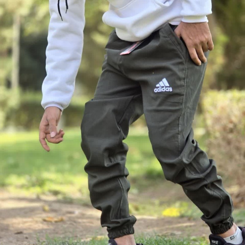 فروش جذاب شلوار اسلش مردانه پسرانه طرح ادیداس تن خور شیک و عالی رنگ سبز  با ارسال رایگان