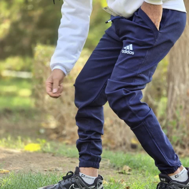 فروش جذاب شلوار اسلش مردانه پسرانه طرح ادیداس تن خور ویژه و خاص رنگ  سرمه ای با ارسال رایگان