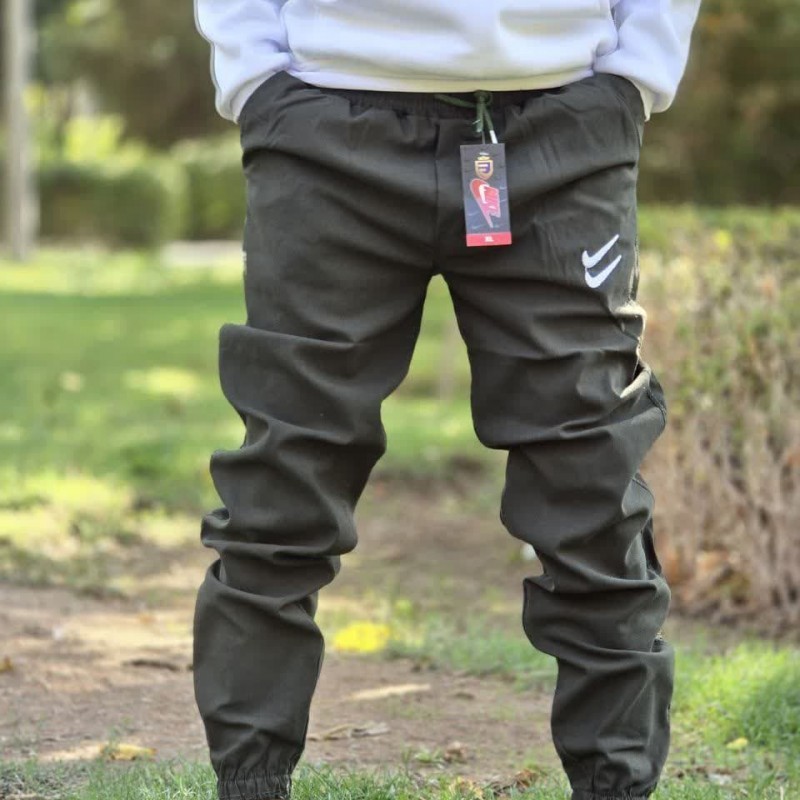 حراج جذاب  شلوار اسلش مردانه پسرانه طرح نایک تن خور  زیبا و شیک رنگ  سبز با ارسال رایگان