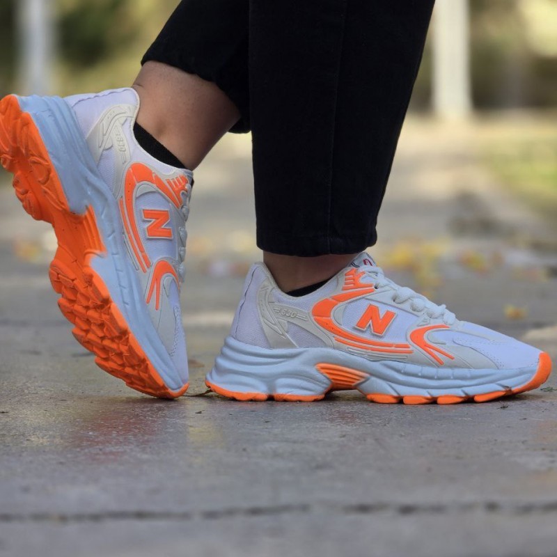 حراج فوق العاده کفش اسپرت نیو بالانس زنانه دخترانه بسیار شیک وخوش پا  رنگ سفید نارنجی با ارسال رایگان