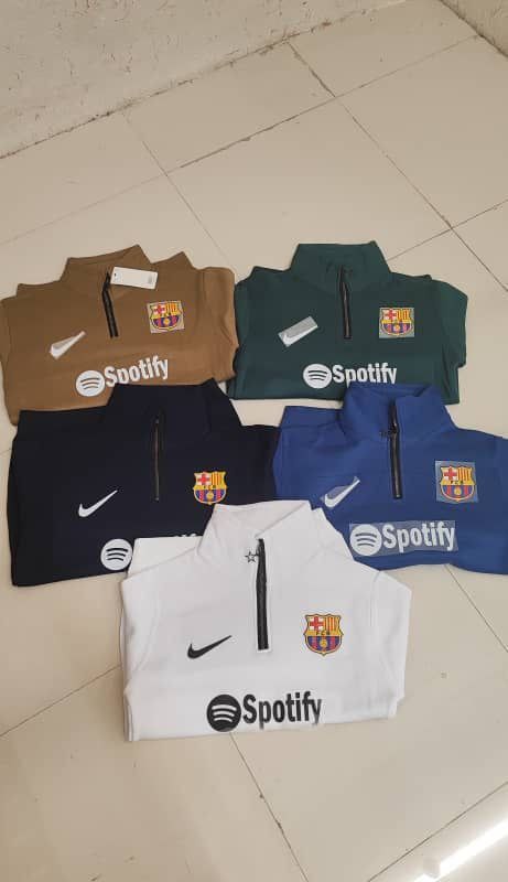 آفر ویژه دورس نیم زیپ مردانه پسرانه بسیار جذاب و شیک رنگ سفید مشکی باارسال رایگان