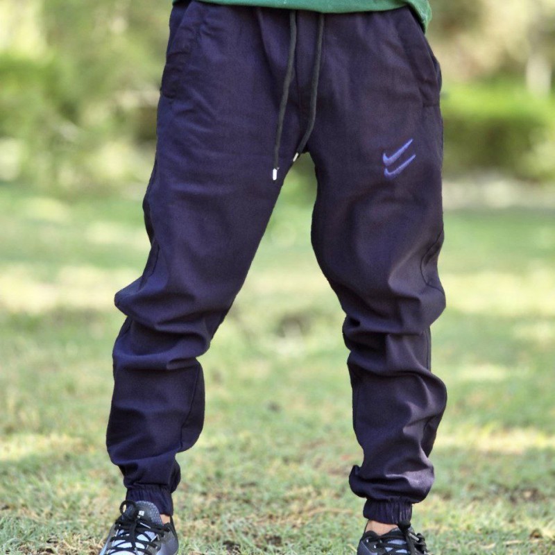 حراااج ویژه شلوار اسلش نایک مردانه پسرانه جیب زیپ دار زیبا و جذاب رنگ سرمه ای  با ارسال رایگان