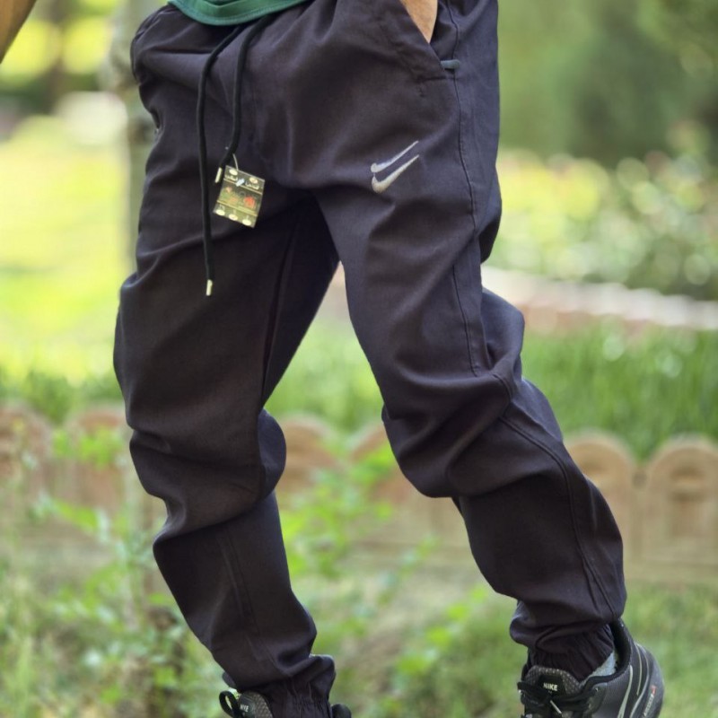 فروش با کیفیت شلوار اسلش نایک مردانه پسرانه جیب زیپ دار  شیک و پرطرفدار رنگ  مشکی با ارسال رایگان