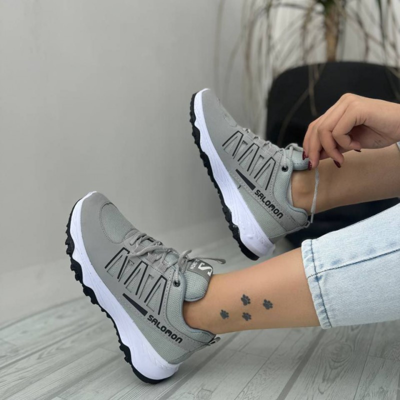 حراااجی  کفش کتونی اسپرت مردانه پسرانه مدل سالامون خاص و جذاب رنگ طوسی مشکی زیره سفید با ارسال رایگان