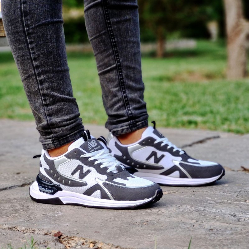 خریدکفش اسپرت مردانه مدل نیوبالانس در رنگبندی متنوع با ارسال رایگان رنگ مشکی طوسی
