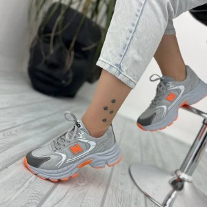 حراج ویژه کفش اسپرت زنانه دخترانه مدل نیوبالانس خاص و دلبر  رنگ طوسی نارنجی  با ارسال رایگان