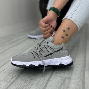 حراااجی  کفش کتونی اسپرت مردانه پسرانه مدل سالامون خاص و جذاب رنگ طوسی مشکی زیره سفید با ارسال رایگان