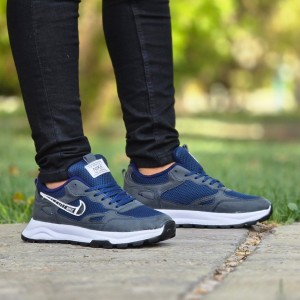 فروش عالی کفش کتونی اسپرت نایک مردانه پسرانه بادوام و مقاوم رنگ طوسی سرمه ای با ارسال رایگان