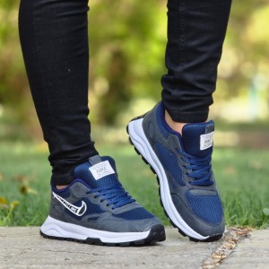 فروش عالی کفش کتونی اسپرت نایک مردانه پسرانه بادوام و مقاوم رنگ طوسی سرمه ای با ارسال رایگان