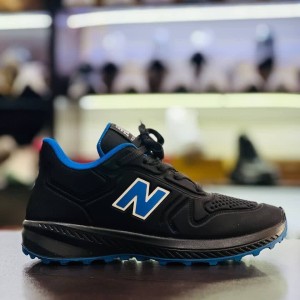 تخفیف بی نظیر کفش کتونی اسپرت مردانه پسرانه مدل نیوبالانس جدید و جذاب  رنگ مشکی نارنجی باارسال رایگان