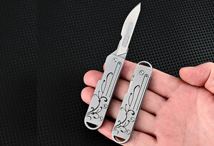 کیفیت چاقو آنباکسینگ فلزی تاشوی قابل آویز از دسته کلید